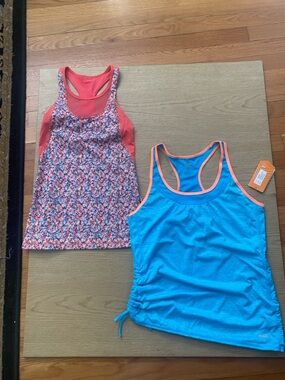 Bundle of 2 RACERBACK TANKS ,NWT  and one with no brand or tags in new condition